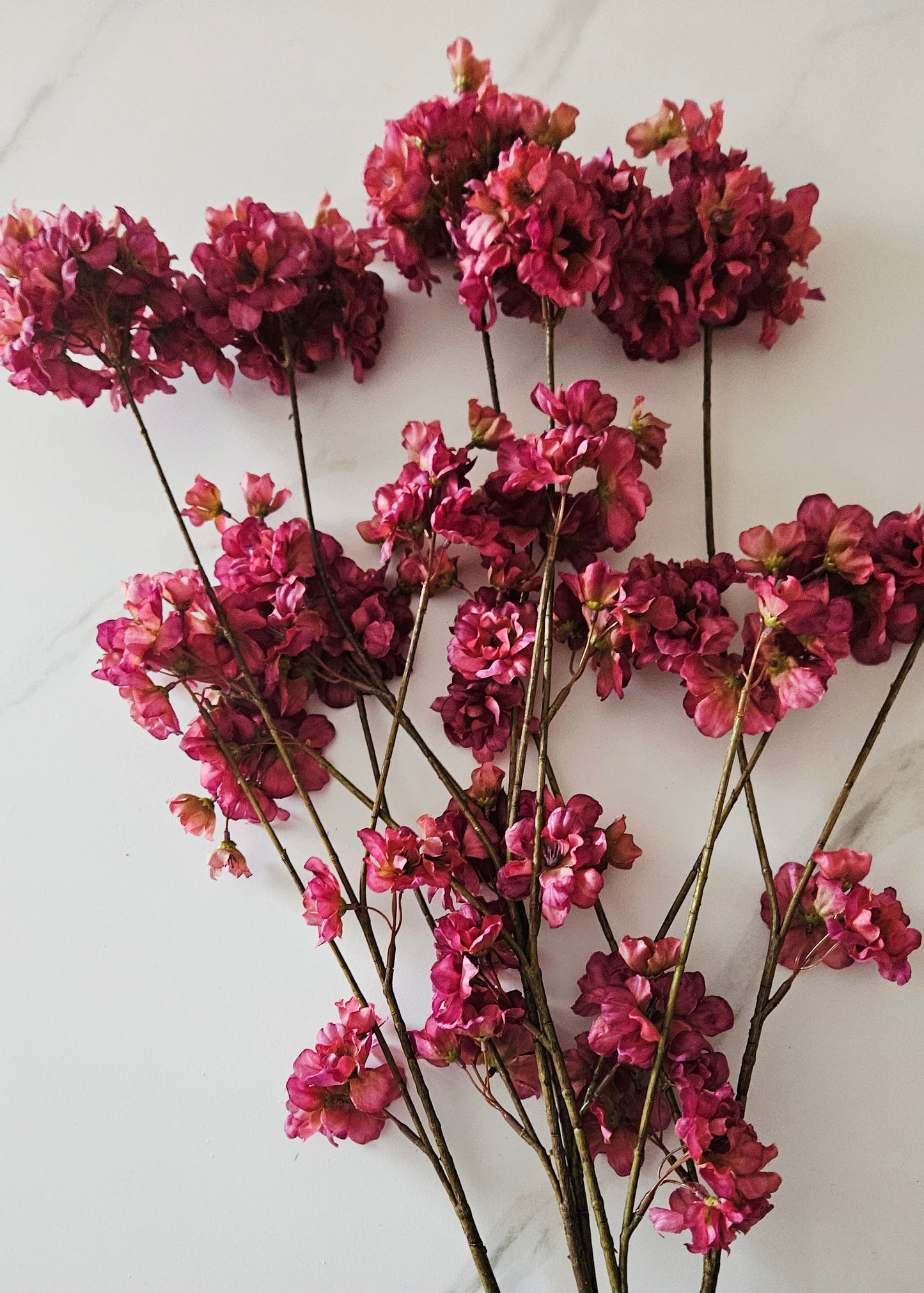 Zijden bloemen paars en donkerrood