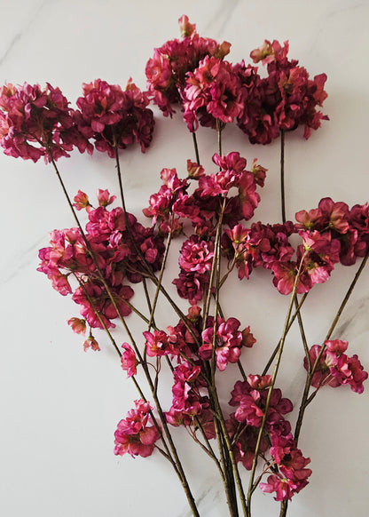 Zijden bloemen paars en donkerrood